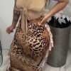 Bottoms female | Leopard Print Side Stitching Fringed Maxi Skirt