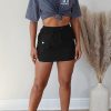 Bottoms female | Casual Drawstring Solid Color Elastic Waist Package Hip Short Skirt