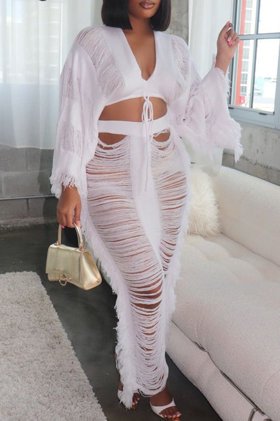 2-Pieces female | V-Neck Knitted Top Ripped Fringed Skirt Set