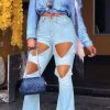 Bottoms female | Statement High Waist Ripped Slim Fit Flare Jeans