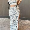 Dresses female | Newspaper Print Cutout Halter Neck Maxi Dress White